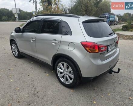 Серый Мицубиси Outlander Sport, объемом двигателя 2 л и пробегом 248 тыс. км за 9999 $, фото 3 на Automoto.ua