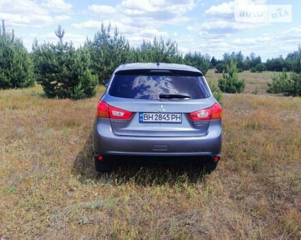 Серый Мицубиси Outlander Sport, объемом двигателя 2 л и пробегом 145 тыс. км за 11300 $, фото 2 на Automoto.ua