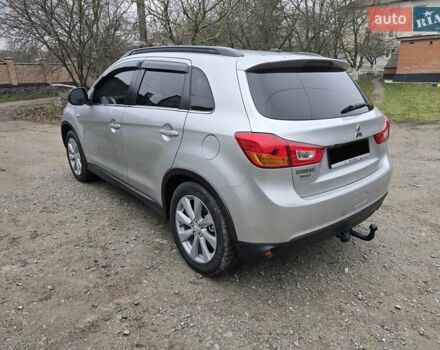 Серый Мицубиси Outlander Sport, объемом двигателя 2 л и пробегом 248 тыс. км за 9999 $, фото 7 на Automoto.ua