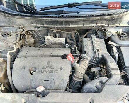 Серый Мицубиси Outlander Sport, объемом двигателя 2 л и пробегом 169 тыс. км за 8800 $, фото 12 на Automoto.ua