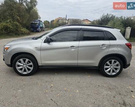 Серый Мицубиси Outlander Sport, объемом двигателя 2 л и пробегом 248 тыс. км за 9999 $, фото 2 на Automoto.ua