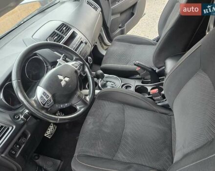 Серый Мицубиси Outlander Sport, объемом двигателя 2 л и пробегом 248 тыс. км за 9999 $, фото 13 на Automoto.ua