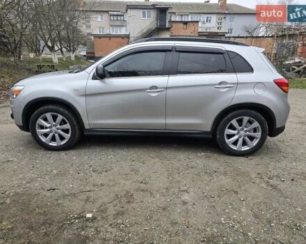 Серый Мицубиси Outlander Sport, объемом двигателя 2 л и пробегом 248 тыс. км за 9999 $, фото 6 на Automoto.ua