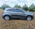 Серый Мицубиси Outlander Sport, объемом двигателя 2 л и пробегом 145 тыс. км за 11300 $, фото 1 на Automoto.ua