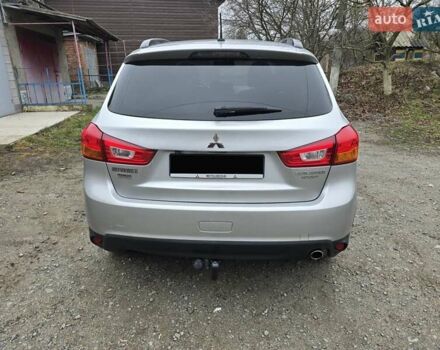Серый Мицубиси Outlander Sport, объемом двигателя 2 л и пробегом 248 тыс. км за 9999 $, фото 1 на Automoto.ua