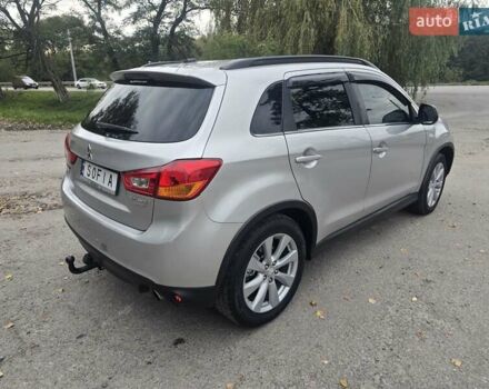 Серый Мицубиси Outlander Sport, объемом двигателя 2 л и пробегом 248 тыс. км за 9999 $, фото 5 на Automoto.ua