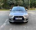 Серый Мицубиси Outlander Sport, объемом двигателя 2 л и пробегом 155 тыс. км за 13500 $, фото 1 на Automoto.ua