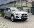 Серый Мицубиси Outlander Sport, объемом двигателя 2 л и пробегом 228 тыс. км за 11000 $, фото 1 на Automoto.ua