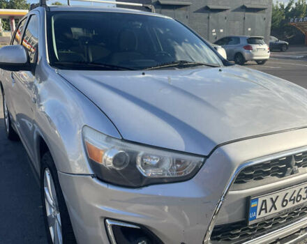 Серый Мицубиси Outlander Sport, объемом двигателя 2 л и пробегом 199 тыс. км за 10000 $, фото 42 на Automoto.ua