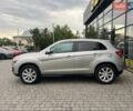 Серый Мицубиси Outlander Sport, объемом двигателя 2 л и пробегом 228 тыс. км за 11000 $, фото 3 на Automoto.ua