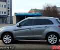 Серый Мицубиси Outlander Sport, объемом двигателя 2 л и пробегом 176 тыс. км за 10400 $, фото 3 на Automoto.ua