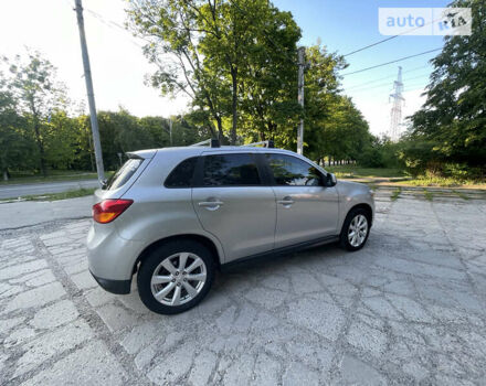 Серый Мицубиси Outlander Sport, объемом двигателя 2 л и пробегом 199 тыс. км за 10000 $, фото 14 на Automoto.ua