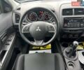 Серый Мицубиси Outlander Sport, объемом двигателя 2 л и пробегом 228 тыс. км за 11000 $, фото 13 на Automoto.ua