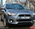Серый Мицубиси Outlander Sport, объемом двигателя 2 л и пробегом 176 тыс. км за 10400 $, фото 7 на Automoto.ua