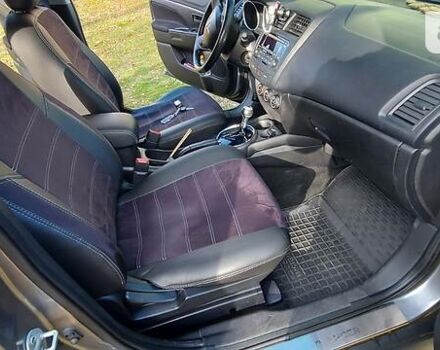 Серый Мицубиси Outlander Sport, объемом двигателя 2 л и пробегом 158 тыс. км за 11850 $, фото 23 на Automoto.ua