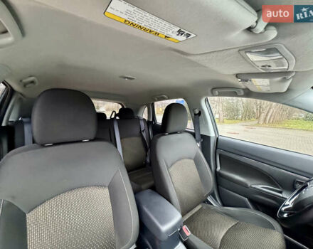 Серый Мицубиси Outlander Sport, объемом двигателя 2 л и пробегом 172 тыс. км за 12700 $, фото 14 на Automoto.ua