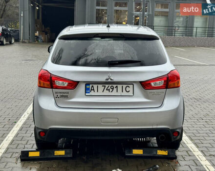 Серый Мицубиси Outlander Sport, объемом двигателя 2 л и пробегом 172 тыс. км за 12700 $, фото 8 на Automoto.ua