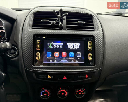 Серый Мицубиси Outlander Sport, объемом двигателя 2 л и пробегом 105 тыс. км за 12900 $, фото 12 на Automoto.ua