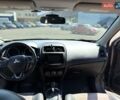 Серый Мицубиси Outlander Sport, объемом двигателя 2 л и пробегом 165 тыс. км за 14000 $, фото 8 на Automoto.ua