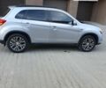 Серый Мицубиси Outlander Sport, объемом двигателя 2 л и пробегом 155 тыс. км за 13400 $, фото 3 на Automoto.ua