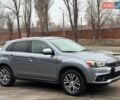 Серый Мицубиси Outlander Sport, объемом двигателя 2 л и пробегом 92 тыс. км за 12400 $, фото 2 на Automoto.ua