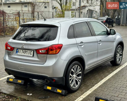 Серый Мицубиси Outlander Sport, объемом двигателя 2 л и пробегом 172 тыс. км за 12700 $, фото 9 на Automoto.ua