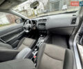 Серый Мицубиси Outlander Sport, объемом двигателя 2 л и пробегом 172 тыс. км за 12700 $, фото 13 на Automoto.ua