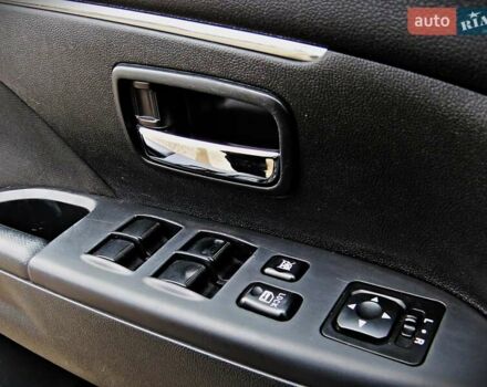 Серый Мицубиси Outlander Sport, объемом двигателя 2 л и пробегом 120 тыс. км за 11700 $, фото 6 на Automoto.ua