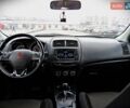 Серый Мицубиси Outlander Sport, объемом двигателя 2 л и пробегом 120 тыс. км за 11700 $, фото 14 на Automoto.ua