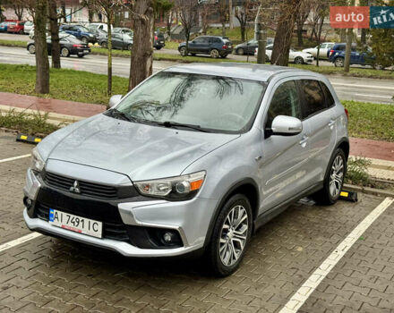 Серый Мицубиси Outlander Sport, объемом двигателя 2 л и пробегом 172 тыс. км за 12700 $, фото 4 на Automoto.ua