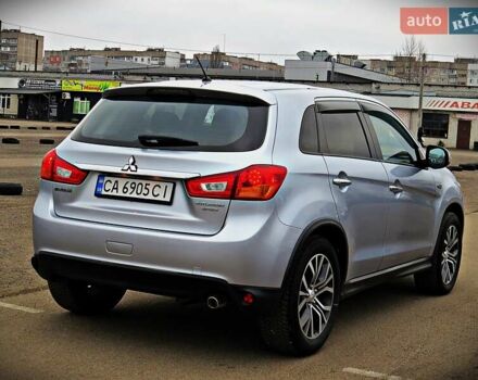 Серый Мицубиси Outlander Sport, объемом двигателя 2 л и пробегом 120 тыс. км за 11700 $, фото 2 на Automoto.ua