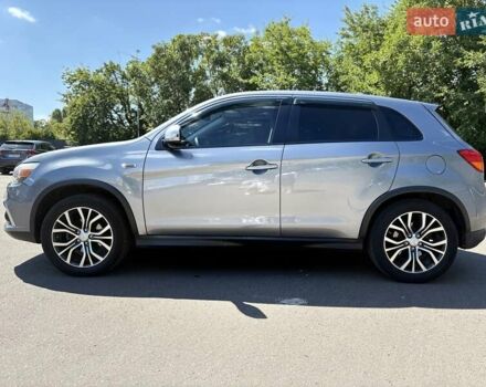 Серый Мицубиси Outlander Sport, объемом двигателя 2 л и пробегом 165 тыс. км за 14000 $, фото 4 на Automoto.ua