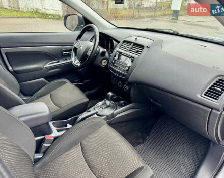 Серый Мицубиси Outlander Sport, объемом двигателя 2 л и пробегом 172 тыс. км за 12700 $, фото 12 на Automoto.ua