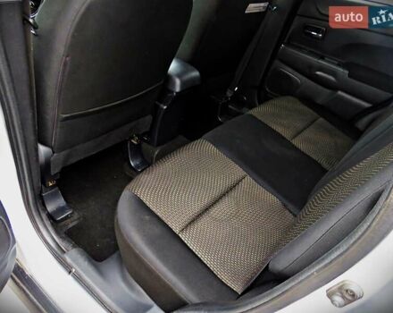 Серый Мицубиси Outlander Sport, объемом двигателя 2 л и пробегом 120 тыс. км за 11700 $, фото 13 на Automoto.ua