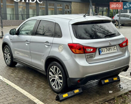 Серый Мицубиси Outlander Sport, объемом двигателя 2 л и пробегом 172 тыс. км за 12700 $, фото 7 на Automoto.ua