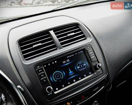 Серый Мицубиси Outlander Sport, объемом двигателя 2 л и пробегом 120 тыс. км за 11700 $, фото 9 на Automoto.ua