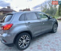 Серый Мицубиси Outlander Sport, объемом двигателя 2 л и пробегом 151 тыс. км за 13000 $, фото 3 на Automoto.ua
