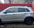 Серый Мицубиси Outlander Sport, объемом двигателя 2 л и пробегом 220 тыс. км за 13000 $, фото 3 на Automoto.ua