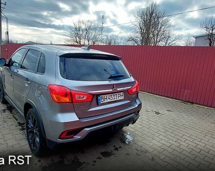 Серый Мицубиси Outlander Sport, объемом двигателя 2 л и пробегом 220 тыс. км за 13000 $, фото 7 на Automoto.ua