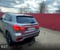 Серый Мицубиси Outlander Sport, объемом двигателя 2 л и пробегом 220 тыс. км за 13000 $, фото 7 на Automoto.ua