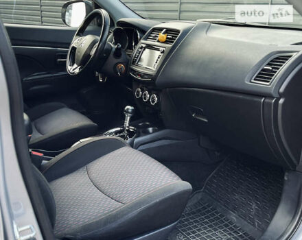Серый Мицубиси Outlander Sport, объемом двигателя 2 л и пробегом 128 тыс. км за 13900 $, фото 23 на Automoto.ua