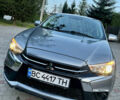 Серый Мицубиси Outlander Sport, объемом двигателя 2 л и пробегом 151 тыс. км за 13000 $, фото 1 на Automoto.ua