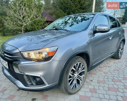 Серый Мицубиси Outlander Sport, объемом двигателя 2 л и пробегом 151 тыс. км за 13000 $, фото 1 на Automoto.ua