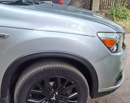 Серый Мицубиси Outlander Sport, объемом двигателя 2 л и пробегом 69 тыс. км за 15000 $, фото 2 на Automoto.ua