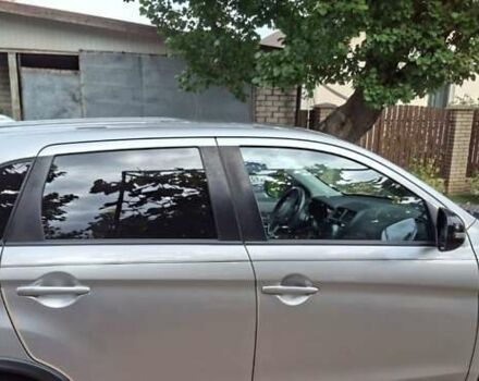 Серый Мицубиси Outlander Sport, объемом двигателя 2 л и пробегом 69 тыс. км за 15000 $, фото 11 на Automoto.ua