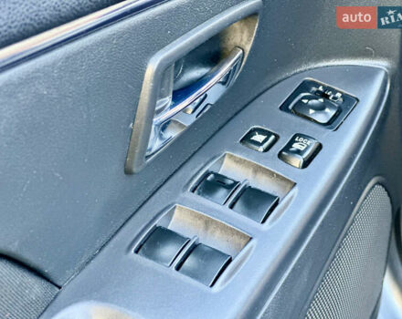 Серый Мицубиси Outlander Sport, объемом двигателя 2 л и пробегом 71 тыс. км за 13900 $, фото 21 на Automoto.ua