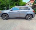 Серый Мицубиси Outlander Sport, объемом двигателя 2 л и пробегом 107 тыс. км за 12200 $, фото 7 на Automoto.ua