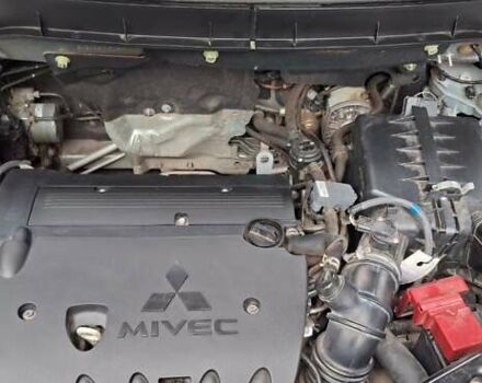 Серый Мицубиси Outlander Sport, объемом двигателя 2 л и пробегом 69 тыс. км за 15000 $, фото 5 на Automoto.ua