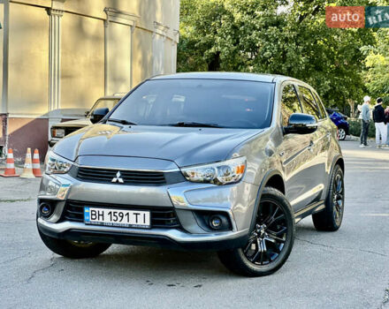 Серый Мицубиси Outlander Sport, объемом двигателя 2 л и пробегом 71 тыс. км за 13900 $, фото 9 на Automoto.ua