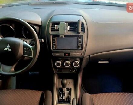 Серый Мицубиси Outlander Sport, объемом двигателя 2 л и пробегом 107 тыс. км за 12200 $, фото 18 на Automoto.ua